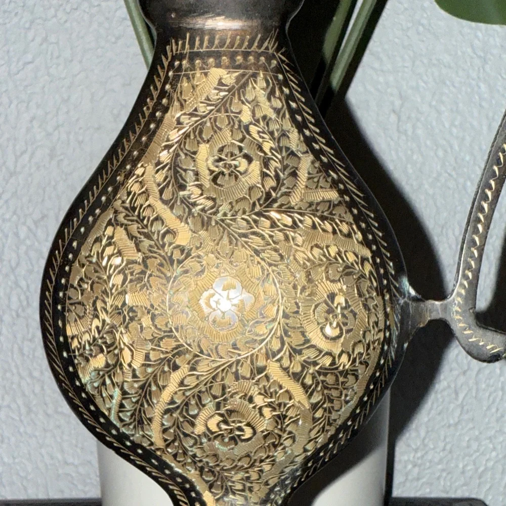 This is a‎ vintage decorative etched brass pitcher or ewer.